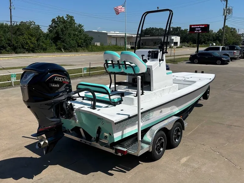 Slide: The Image of Freedom Warrior 2026 boat on trailer with Yamaha engine. - 5