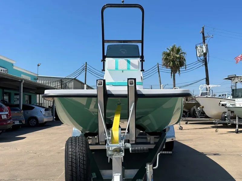 Slide: The Image of Freedom Warrior 2026 boat on trailer in sunny weather. - 8