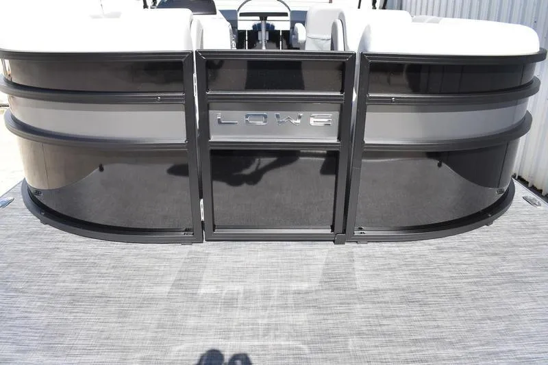 Slide: The Image of 2026 Lowe SS 230 pontoon boat with sleek black and gray design. - 10