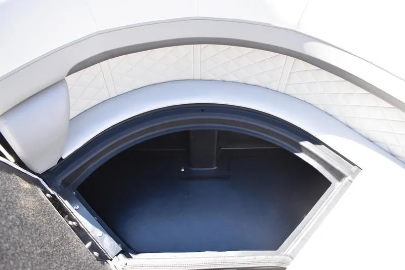 Slide: The Image of Storage compartment in 2026 Lowe SS 230 boat with quilted upholstery. - 13
