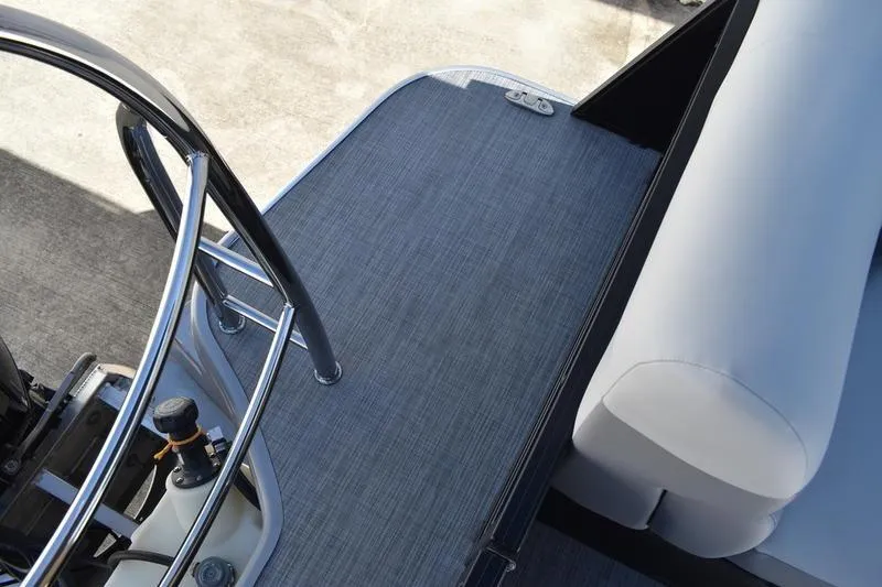 Slide: The Image of 2026 Lowe SS 230 boat deck with sleek railing and cushioned seating. - 35