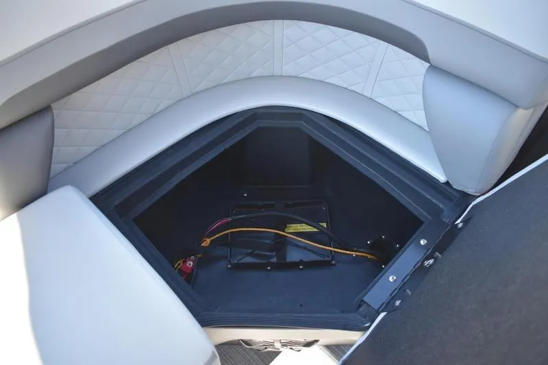 Slide: The Image of Storage compartment in 2026 Lowe SS 230 boat with quilted upholstery. - 38