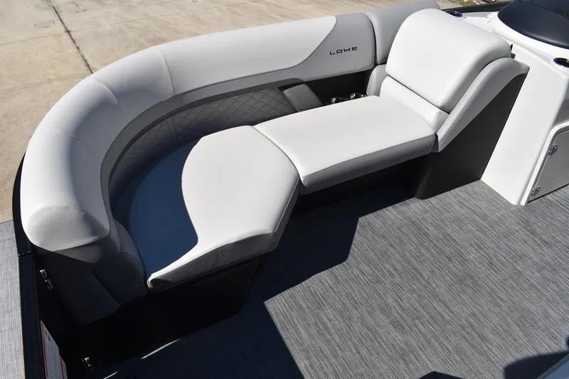 Slide: The Image of Luxurious seating on 2026 Lowe SS 230 boat with modern design and gray upholstery. - 4