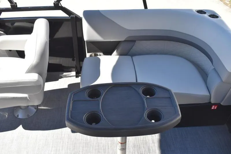 Slide: The Image of Pontoon boat interior with gray seating and table, Lowe SS 230, 2026 model. - 41
