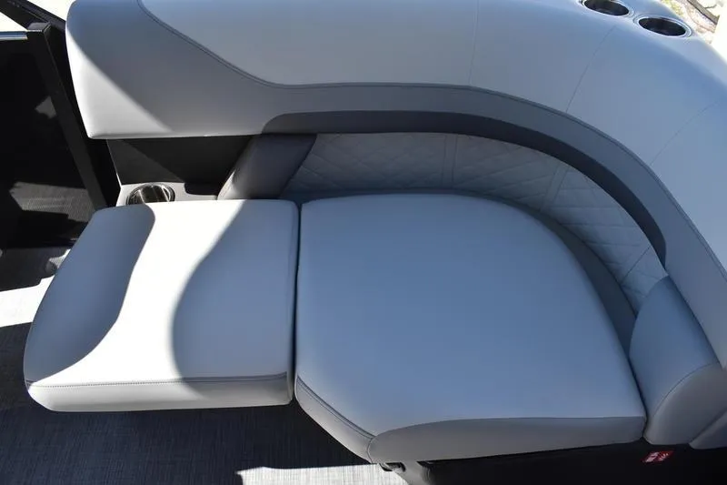 Slide: The Image of Luxurious seating on 2026 Lowe SS 230 boat, featuring sleek gray upholstery and modern design. - 45