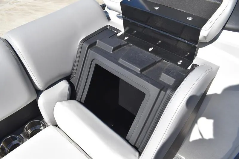 Slide: The Image of Open storage compartment in 2026 Lowe SS 230 boat with cushioned seating. - 5