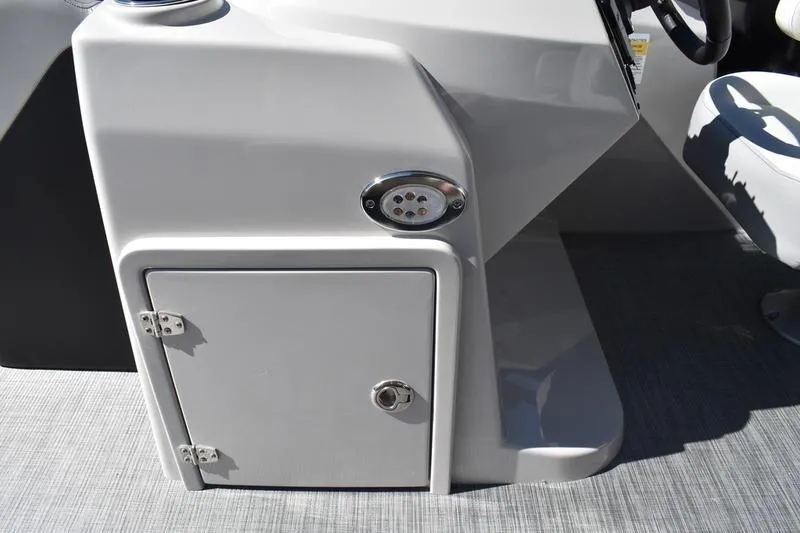 Slide: The Image of 2026 Lowe SS 230 boat console with storage compartment and sleek design. - 6