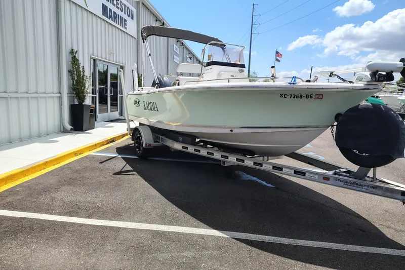 Slide: The Image of 2017 Sea Hunt Triton 188 boat on trailer outside Charleston Marine dealership. - 1