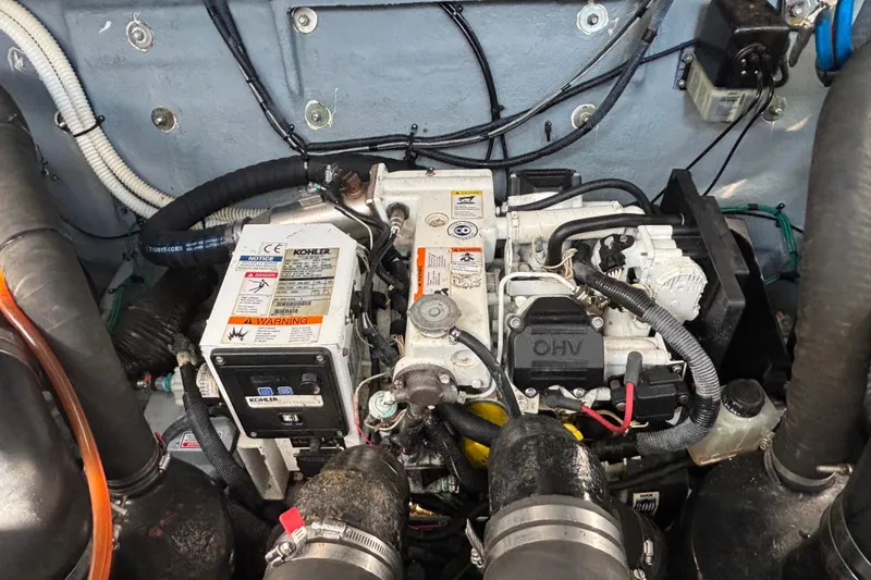 Slide: The Image of Engine compartment of a 2003 Sea Ray Sundancer 320 with Kohler generator. - 15