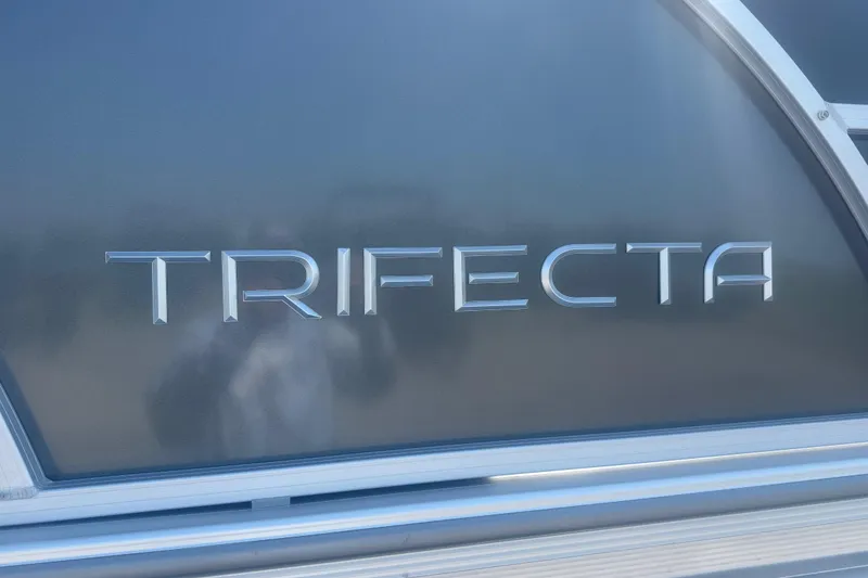 Slide: The Image of Trifecta 22 LE RF LE 2.75, 2026 model, logo on sleek metallic surface. - 6