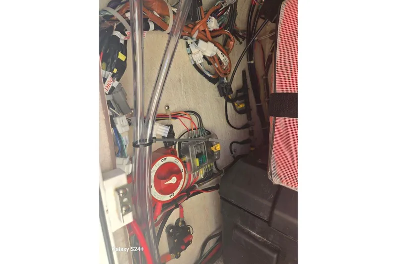 Slide: The Image of Electrical wiring and components inside a 2023 Layton Bay 22 boat. - 11