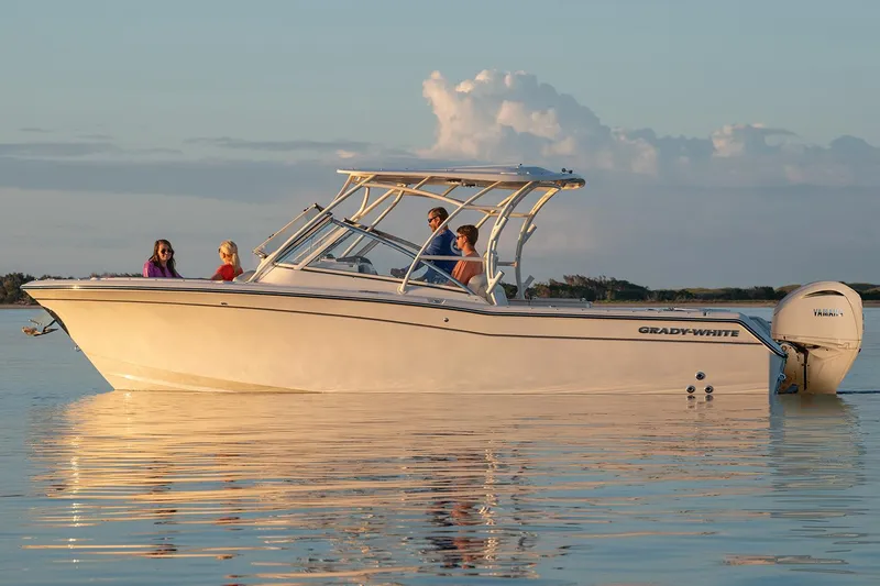Slide: The Image of 2025 Grady-White Freedom 275 boat interior with seating and storage features. - 2