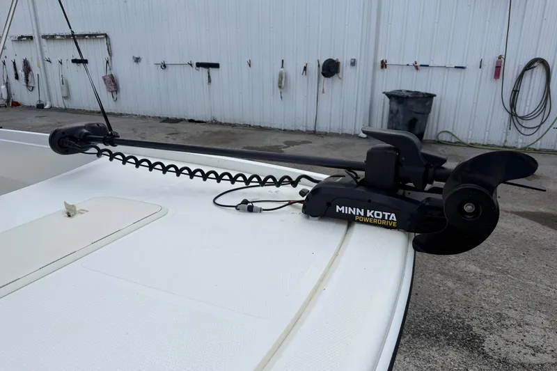 Slide: The Image of Minn Kota PowerDrive trolling motor on 2018 Mako Pro Skiff 17 CC boat deck. - 19