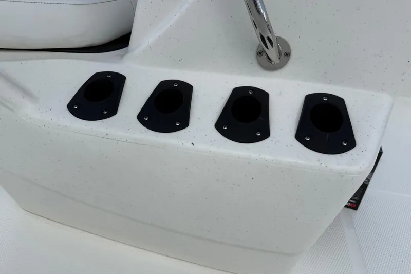 Slide: The Image of Four rod holders on a 2018 Mako Pro Skiff 17 CC boat. - 26