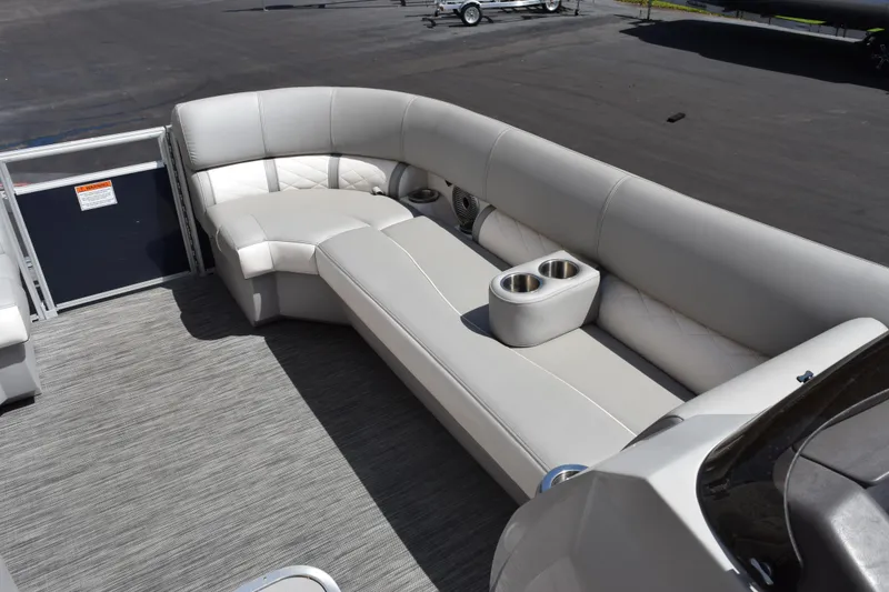 Slide: The Image of Luxurious seating on 2021 Bennington L 23 Swingback pontoon boat with cup holders. - 11