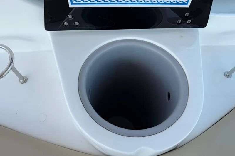 Slide: The Image of Cup holder on 2019 Rinker EX 320 boat deck, featuring sleek design elements. - 11