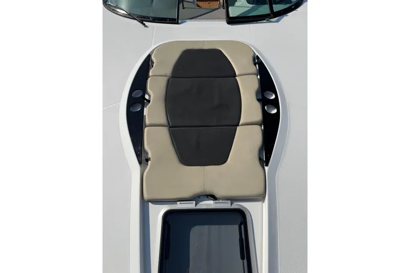 Slide: The Image of 2019 Rinker EX 320 boat control panel with joystick and Raymarine system. - 37