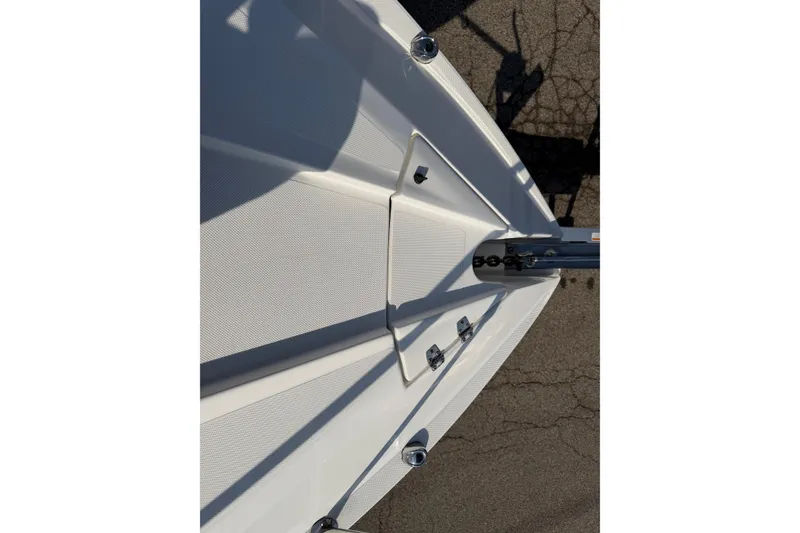 Slide: The Image of 2019 Rinker EX 320 cabin interior with bed, sofa, and kitchenette. - 38