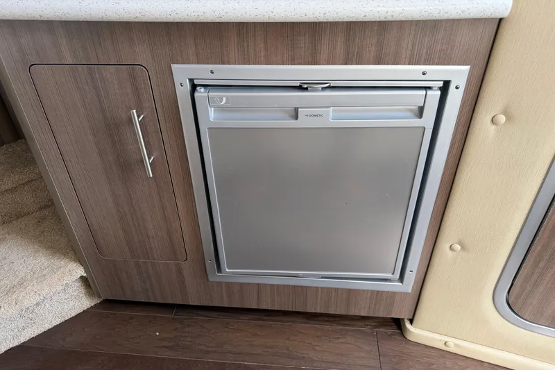 Slide: The Image of Modern kitchen sink and faucet in 2019 Rinker EX 320 boat. - 45