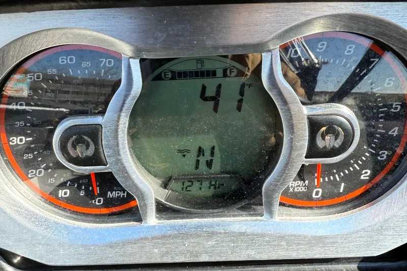Slide: The Image of Dashboard of 2024 Scarab 195 ID showing speed, RPM, and temperature. - 15