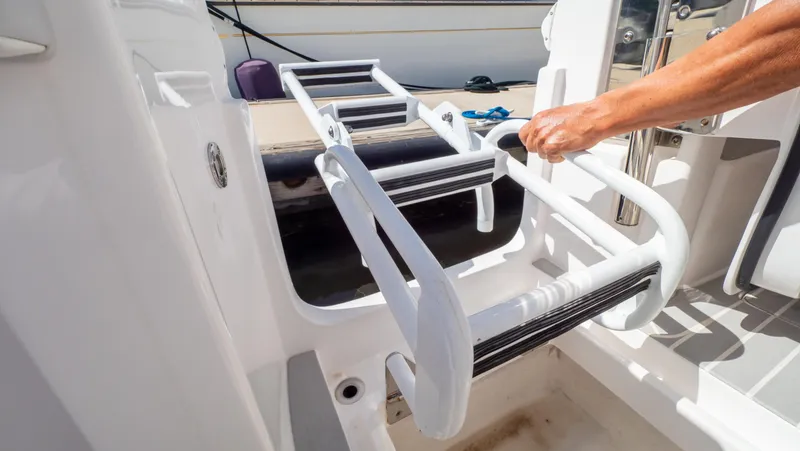 Slide: The Image of Boarding ladder on 2022 Intrepid 345 Valor boat, featuring sturdy handrails and non-slip steps. - 41