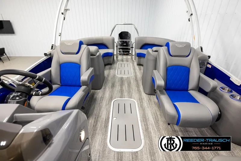 Slide: The Image of 2025 Bennington LTFBSE pontoon boat interior with blue and gray seating. - 14