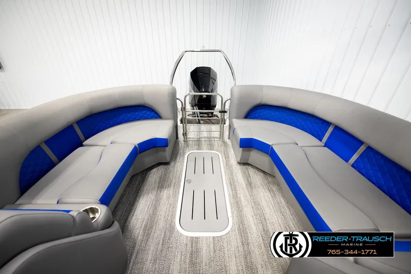 Slide: The Image of 2025 Bennington LTFBSE boat interior with gray and blue seating, modern design. - 21