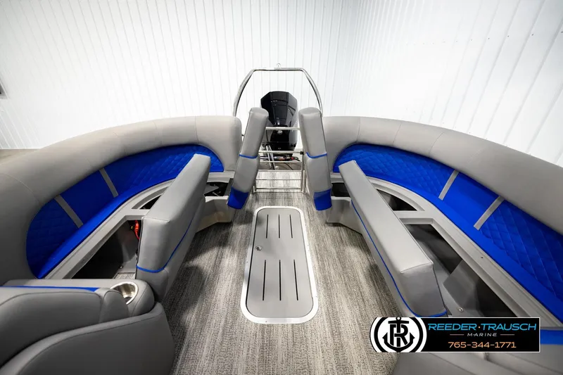 Slide: The Image of 2025 Bennington LTFBSE pontoon boat interior with gray and blue seating. - 22