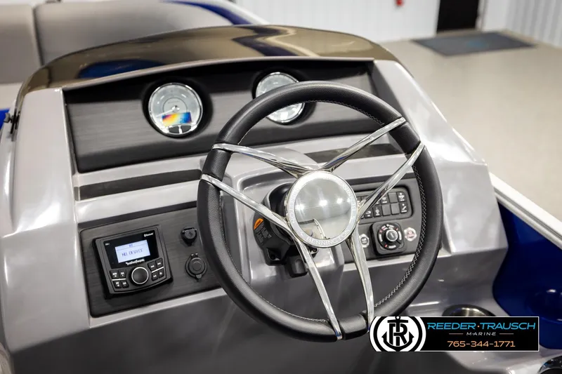 Slide: The Image of Steering console of 2025 Bennington LTFBSE boat with modern controls and gauges. - 30