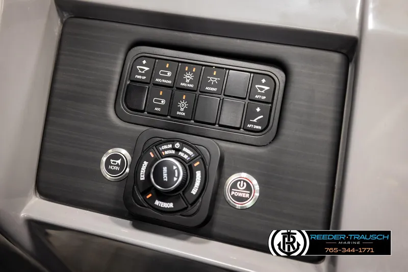Slide: The Image of Control panel of 2025 Bennington LTFBSE boat with various function buttons and dials. - 35