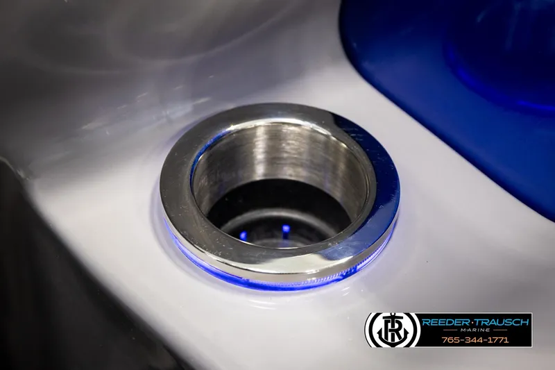 Slide: The Image of 2025 Bennington LTFBSE boat cup holder with blue LED lighting. - 36