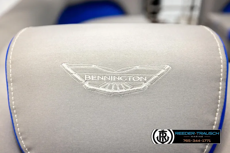 Slide: The Image of Gray Bennington LTFBSE 2025 boat seat with embroidered logo and blue accents. - 39