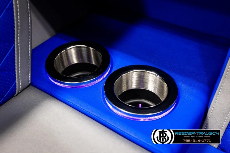 Slide: The Image of Blue interior cup holders in 2025 Bennington LTFBSE boat, featuring sleek design. - 42