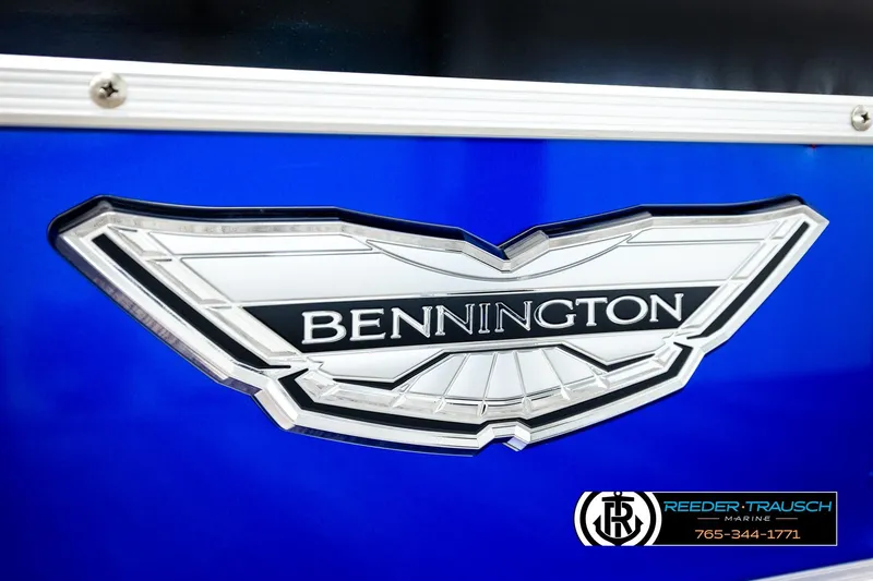 Slide: The Image of 2025 Bennington LTFBSE logo on a vibrant blue background, featuring Reeder-Trausch Marine branding. - 52