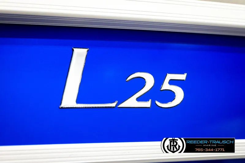 Slide: The Image of Alt text: "2025 Bennington LTFBSE boat model L25, blue background, Reeder-Trausch Marine logo." - 54