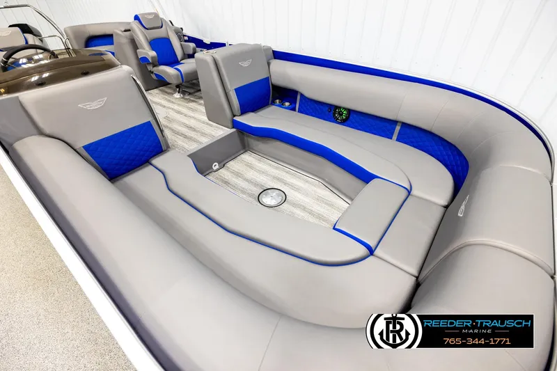 Slide: The Image of Luxurious 2025 Bennington LTFBSE boat interior with gray and blue seating, modern design. - 9