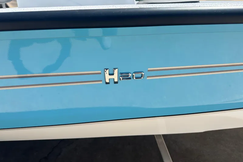 Slide: The Image of Trailer frame with "Back Track Trailers" logo, part of 2026 Xpress H20B Bay boat. - 13