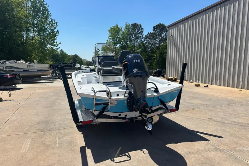 Slide: The Image of Steering console of 2026 Xpress H20B Bay boat with gauges and controls. - 6