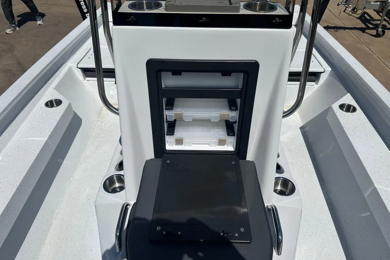 Slide: The Image of 2026 Xpress H20B Bay boat interior with gray seating and diamond stitching. - 8