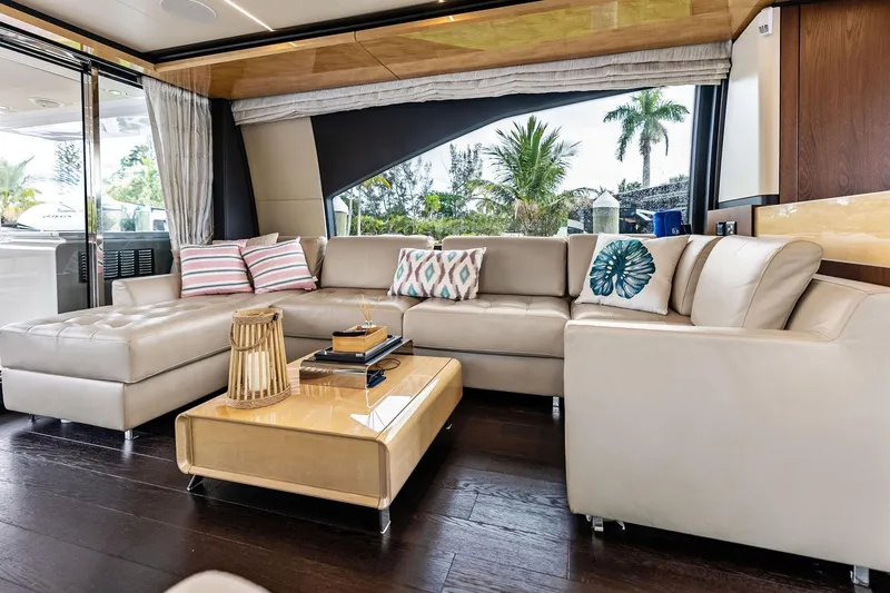 Slide: The Image of Luxurious interior of 2017 Azimut Fly 72 yacht with elegant beige seating and decorative pillows. - 17