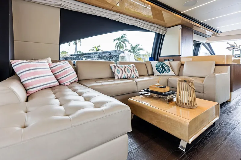 Slide: The Image of Luxurious interior of 2017 Azimut Fly 72 yacht with elegant beige seating and decorative pillows. - 18