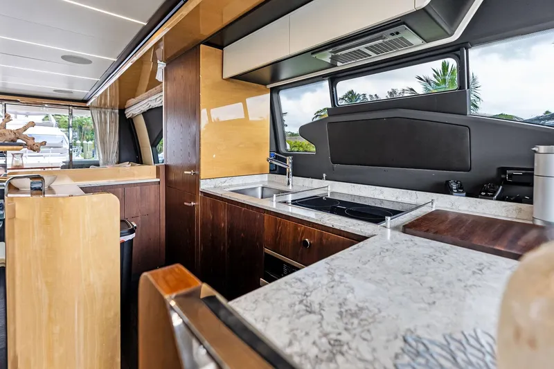 Slide: The Image of Luxurious kitchen interior of 2017 Azimut Fly 72 yacht with modern appliances and sleek design. - 23