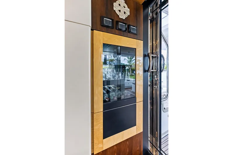 Slide: The Image of Luxurious interior of 2017 Azimut Fly 72 yacht with elegant glass cabinet. - 28