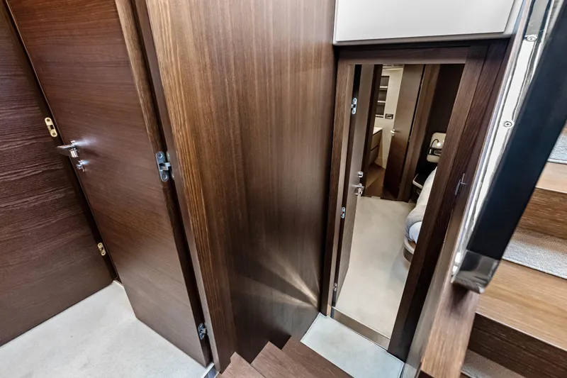 Slide: The Image of Interior view of 2017 Azimut Fly 72 yacht with wooden doors and stairs. - 30