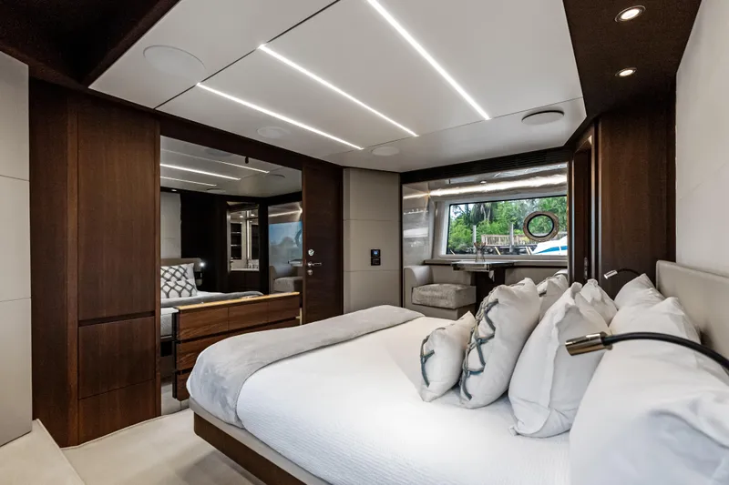 Slide: The Image of Luxurious bedroom interior of 2017 Azimut Fly 72 yacht with modern design and elegant furnishings. - 32