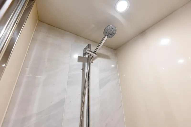 Slide: The Image of Shower area in 2017 Azimut Fly 72 yacht, featuring modern fixtures and lighting. - 44