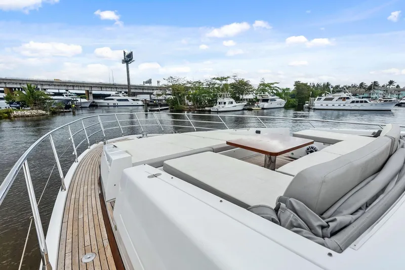 Slide: The Image of Luxurious 2017 Azimut Fly 72 yacht with spacious deck and scenic marina view. - 5