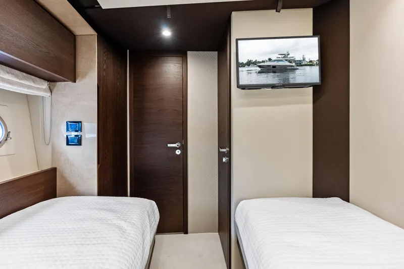 Slide: The Image of Luxurious cabin interior of 2017 Azimut Fly 72 yacht with twin beds and TV. - 50