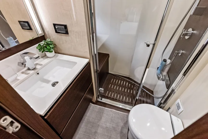 Slide: The Image of Luxurious bathroom in 2017 Azimut Fly 72 yacht with modern fixtures and elegant design. - 52