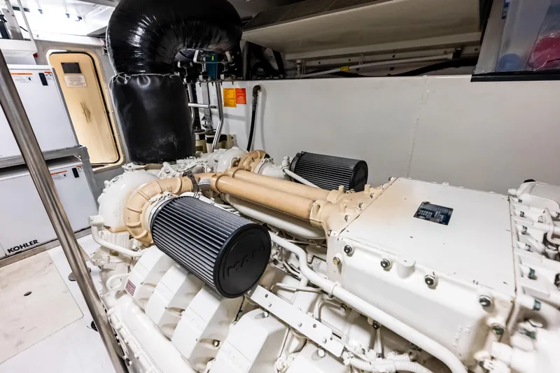 Slide: The Image of Engine room of 2017 Azimut Fly 72 yacht, featuring a powerful marine engine. - 88